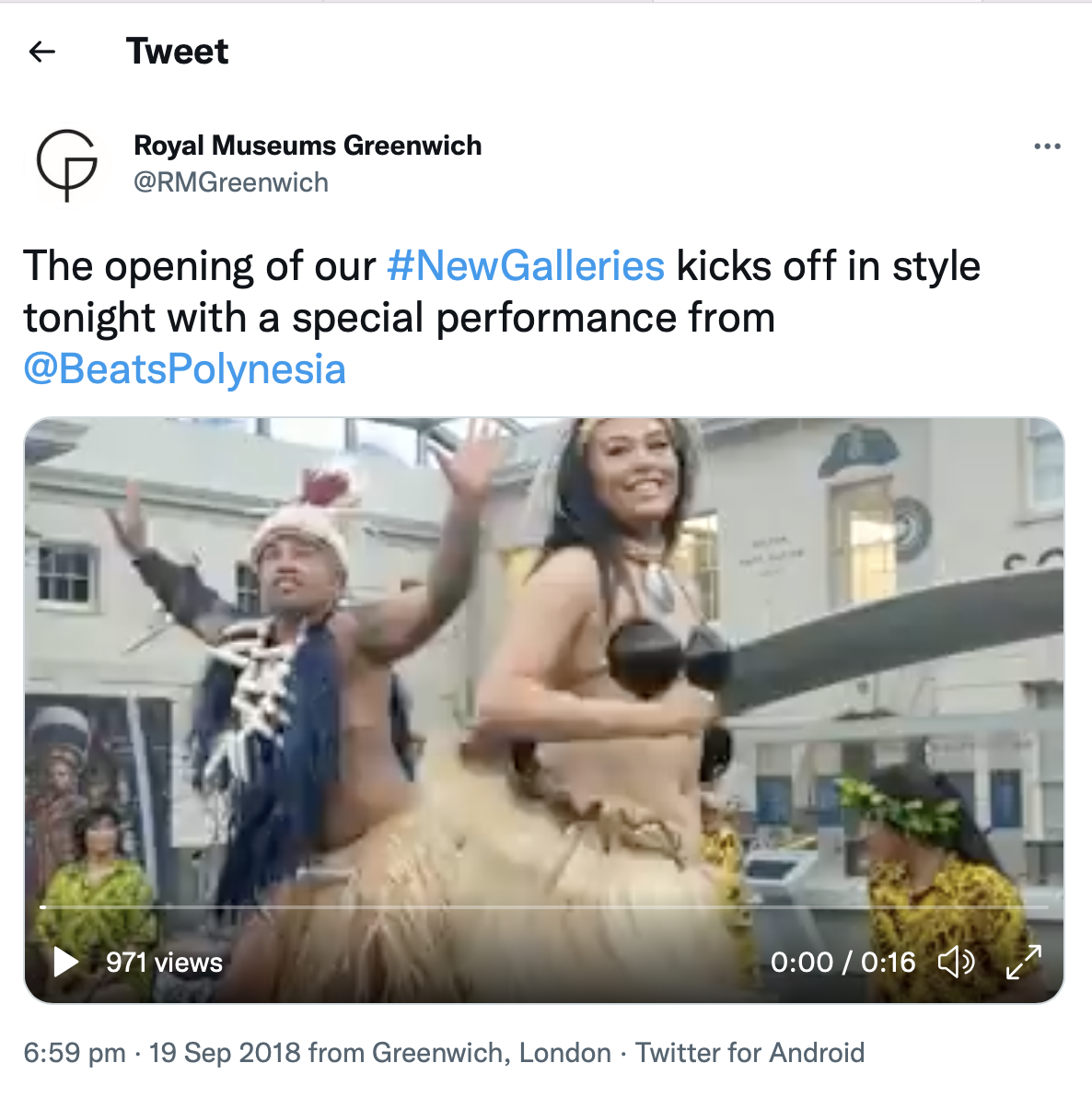 A screen shot of a Tweet showing a performance featuring dancers in traditional attire, celebrating the opening of the new galleries at the Royal Museums Greenwich.